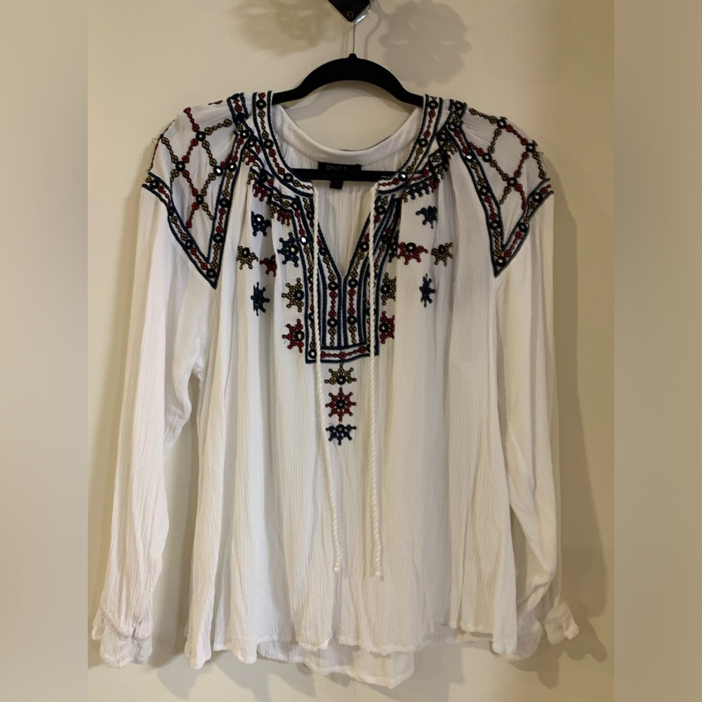 Off white top with navy and red embroidery. Size medium